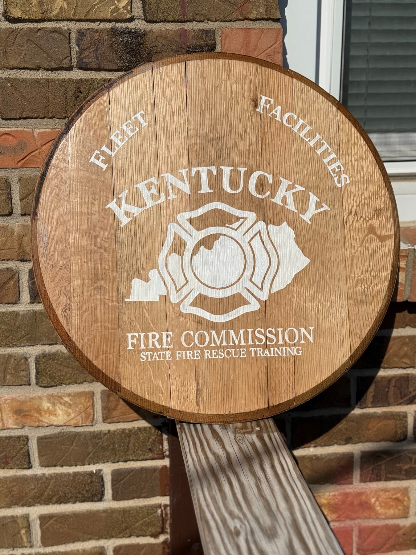 Institutional seal engraved on bourbon barrel head
