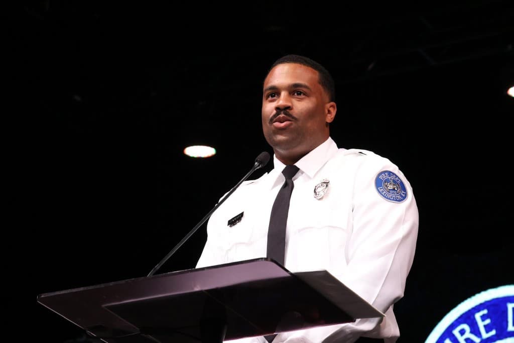 Speaking at the podium in Lexington Fire Department dress uniform